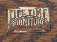 Original Lifetime Furniture Co. decal signature example to compare with the remnant decal remaining on this desk.  (This is not the decal on this desk, comparison only, please view other image of signature.)